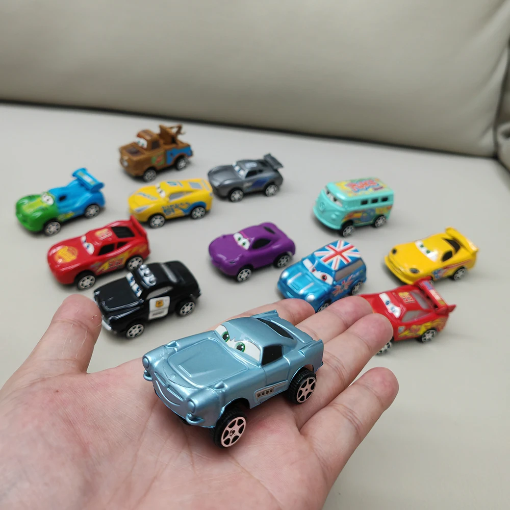 kf-S1e3df559aa904701bc0d5ec8bc588a79i-12-unids-set-Disney-Pixar-Cars-Lightning-Mcqueen-Jackson-Storm-Mater-modelo-de-Pvc-coche-de