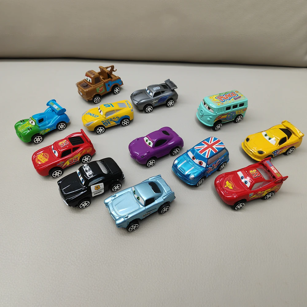 kf-Sdec7c5ec643b42c593c53d66854614110-12-unids-set-Disney-Pixar-Cars-Lightning-Mcqueen-Jackson-Storm-Mater-modelo-de-Pvc-coche-de